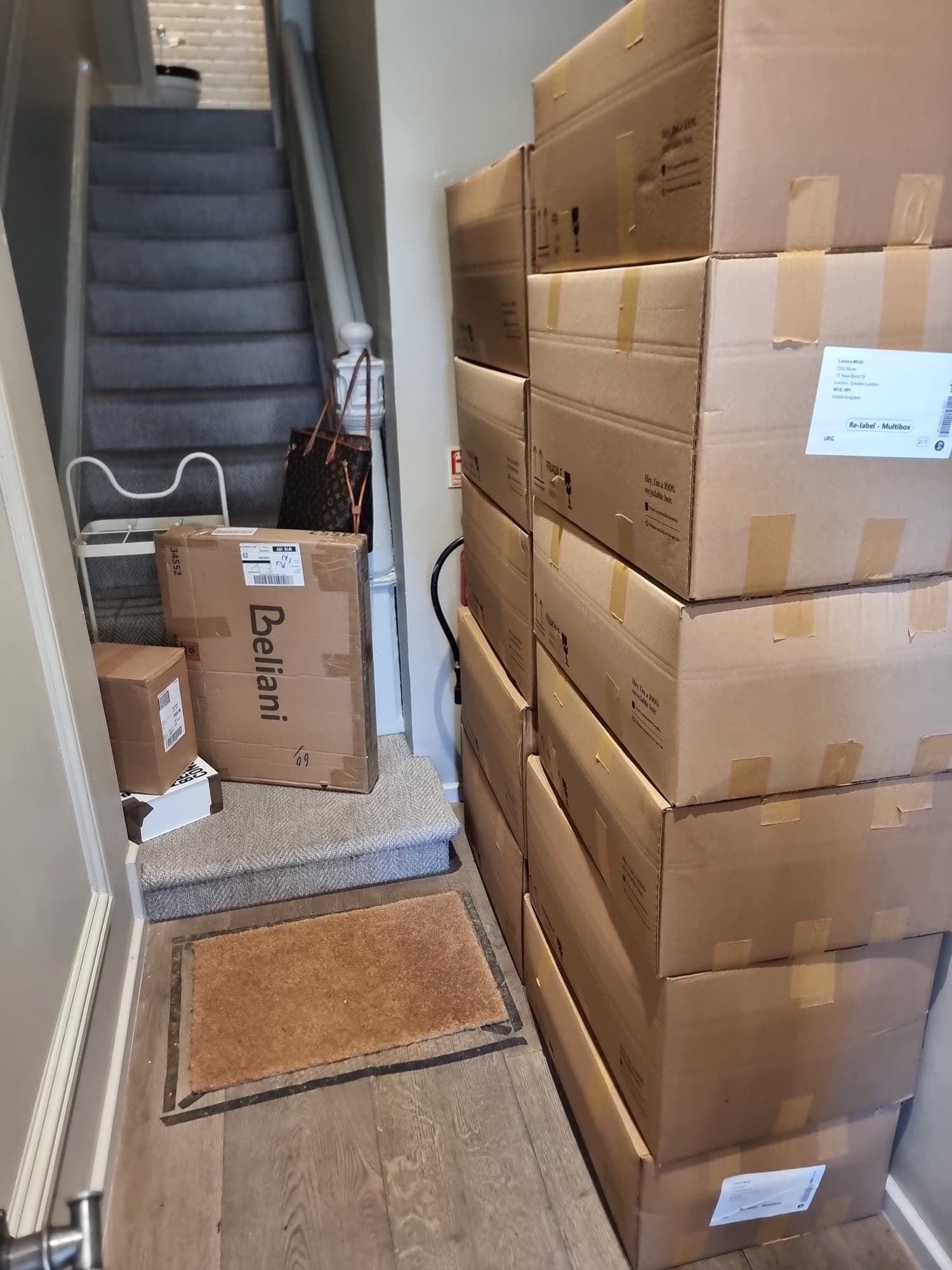 Boxes and furniture ready for a man and van home collection
